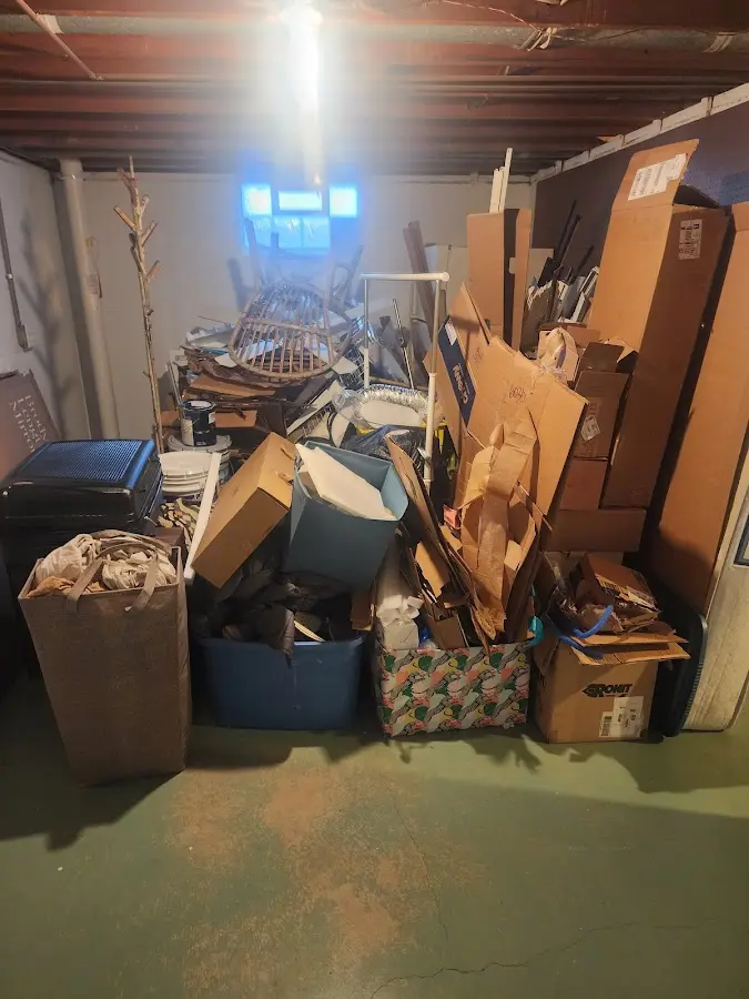 Roll-off dumpster container at job site for 6 Yard Dumpster Rental in Three Rivers